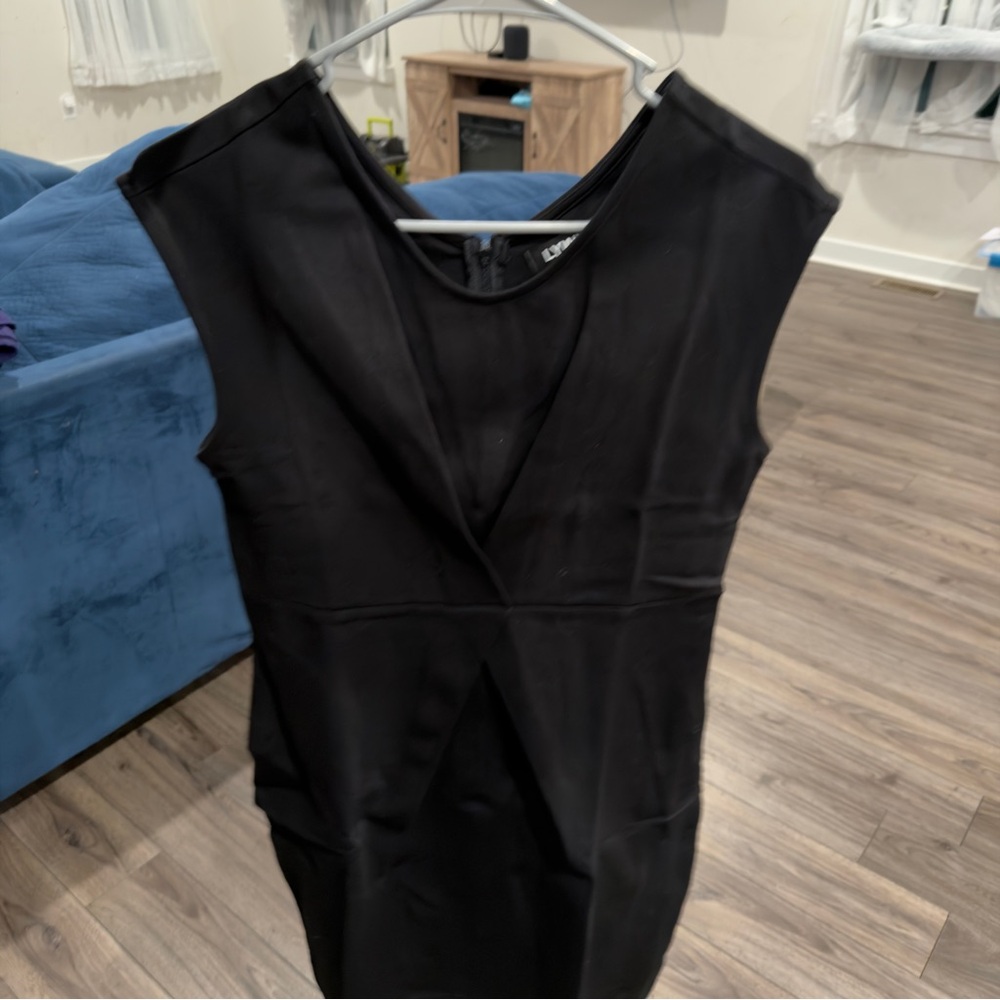 Elegant Black Dress. I have 4 of them. 3 Large 1 Medium. LYWIO brand
